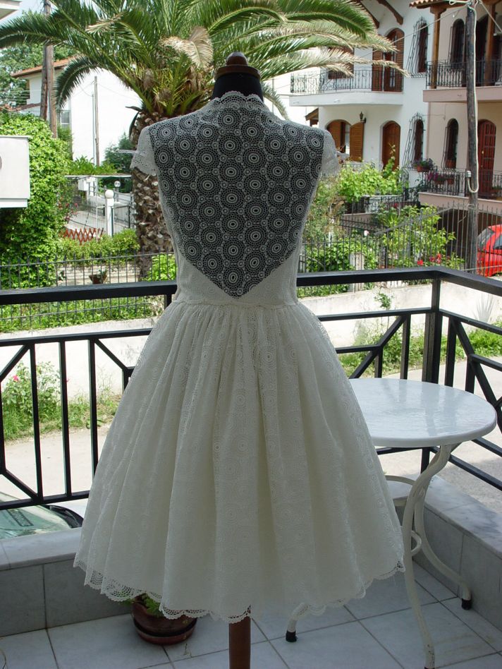 lovely lace LWDs for the brides wedding reception look cap sleeves with bows