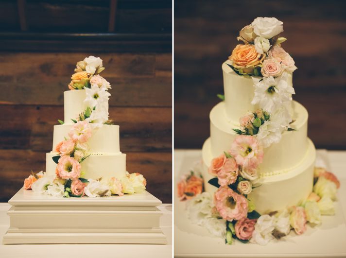 3 tier wedding cake with cascading florals