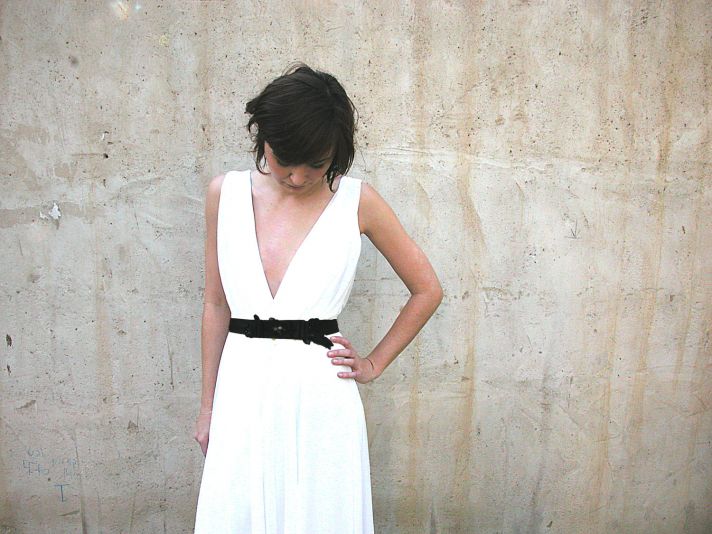 simple draped white wedding dress with black sash