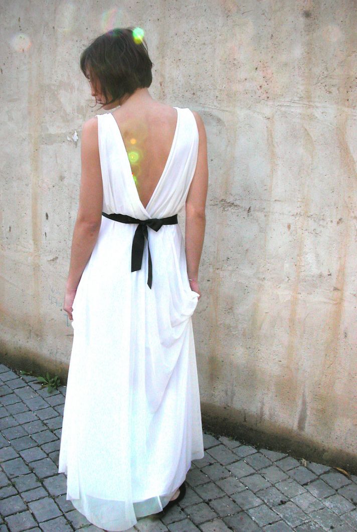 simple draped white wedding dress with black sash