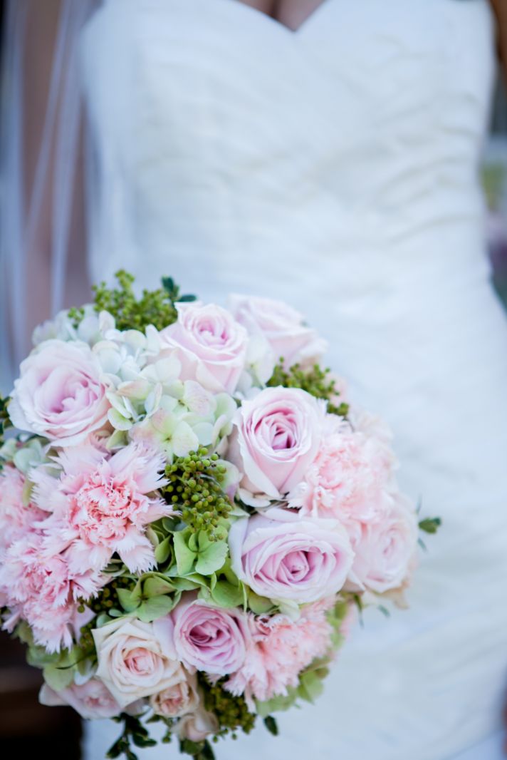 Romantic wedding bouquet with light pink roses celery green hydgrangeas