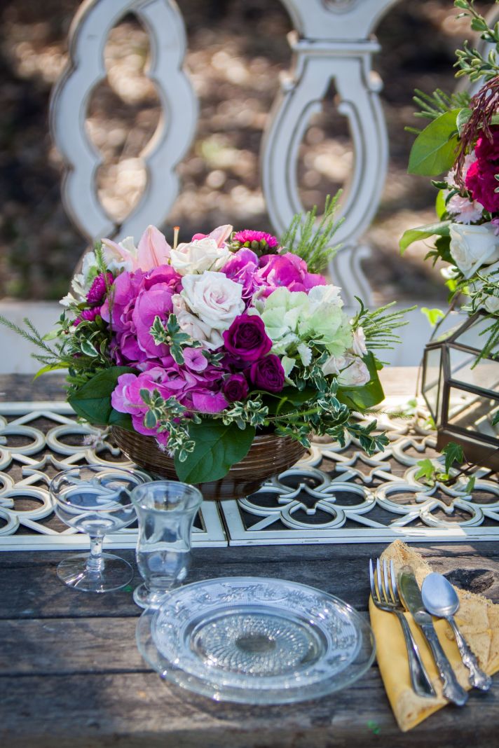 Romantic outdoor wedding reception table vintage chairs