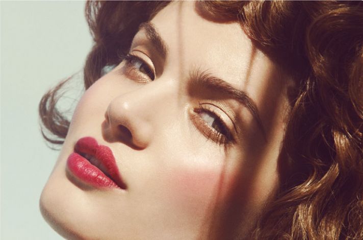 Red lips and sky blue eye lids for retro glam brides