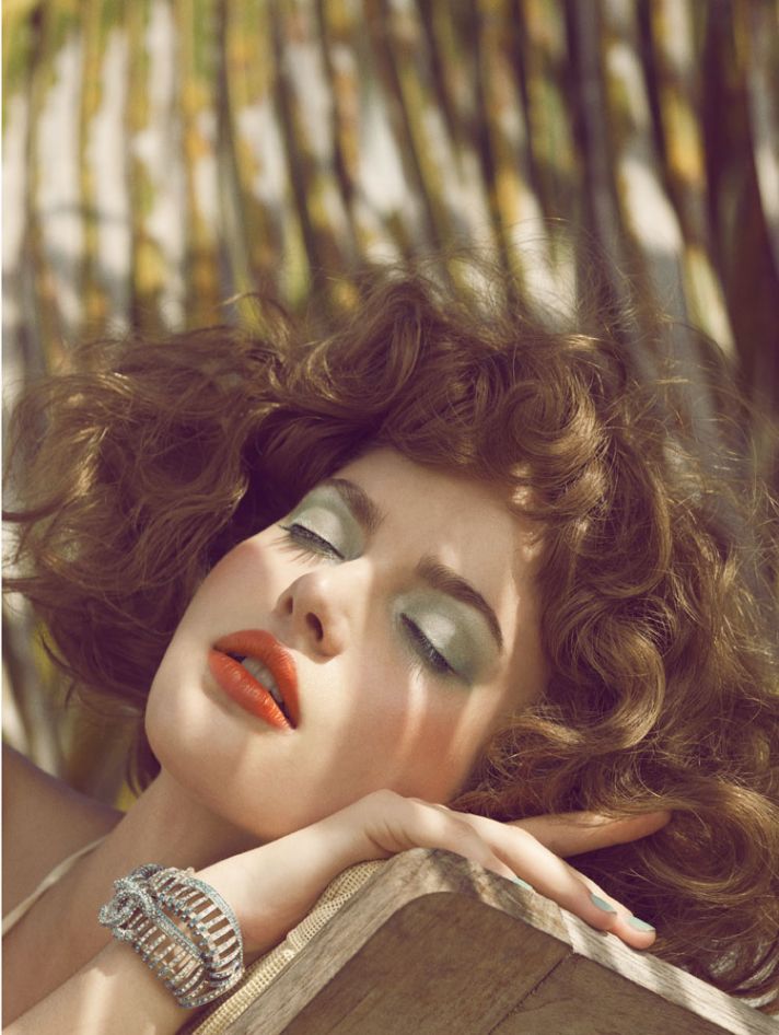 Red lips and sky blue eye lids for retro glam brides