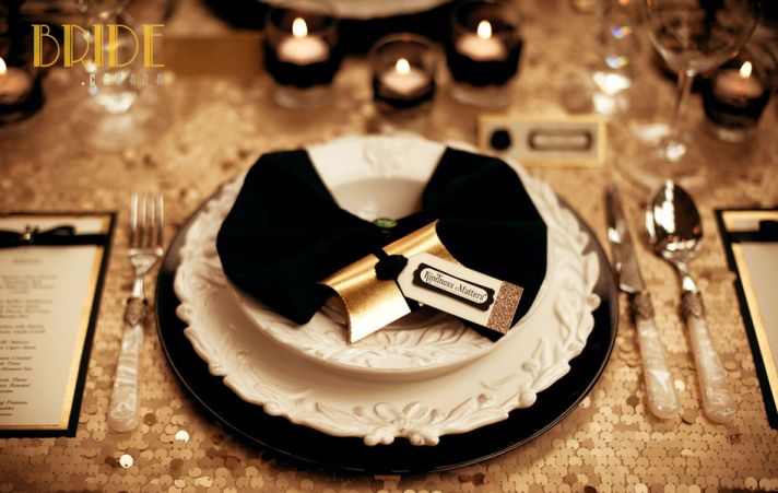 sparkly gold wedding table linens with black accents