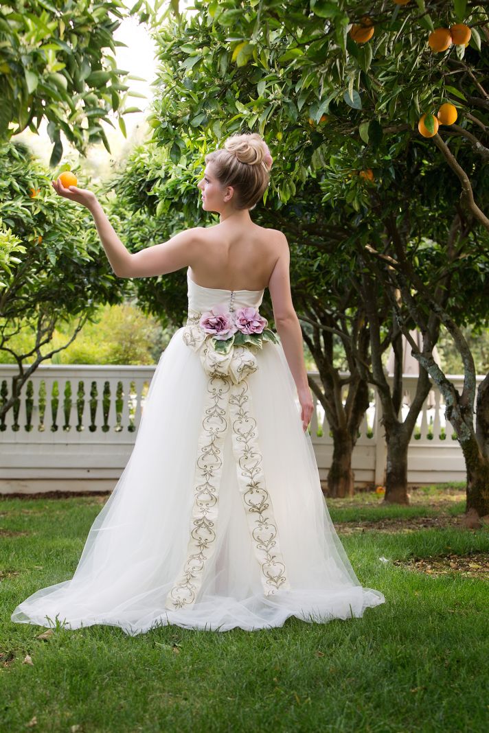 Unique floral bow wedding gown by Amy Jo Tatum