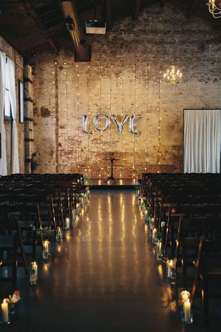 Ceremony Aisle with Love Sign At Alter