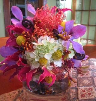 colorful-low-table-centerpiece-bright-pink-purple-white-yellow-orange
