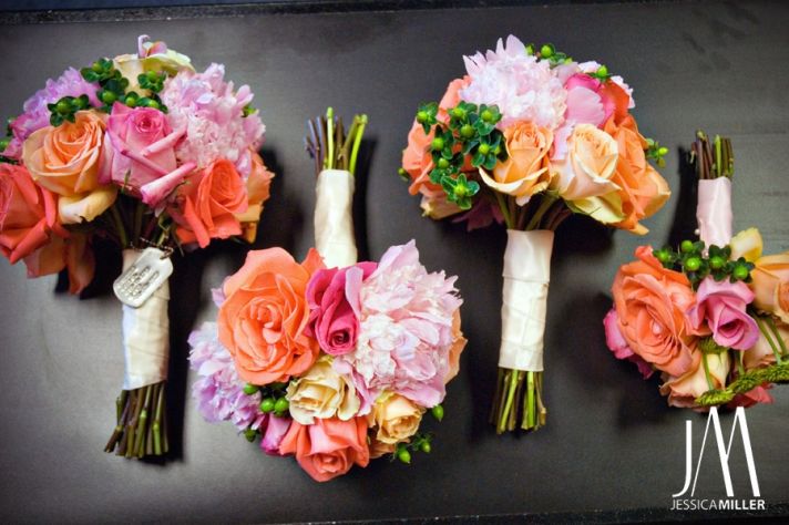 Beautiful vibrant hot pink, light pink, orange and coral bridal and bridesmaids’ bouquets