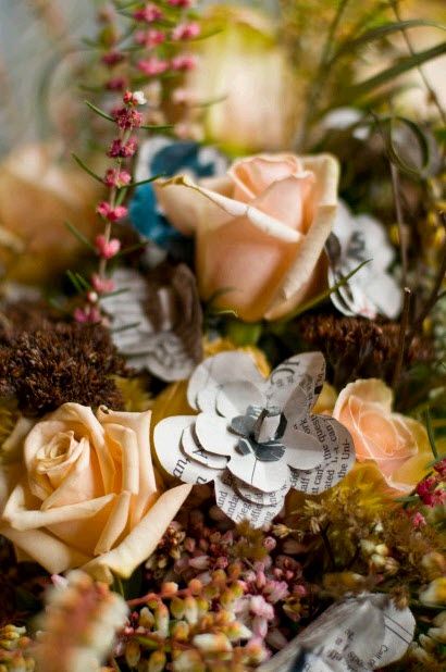 Detail shot of rustic winter wedding bridal bouquet made with paper flowers