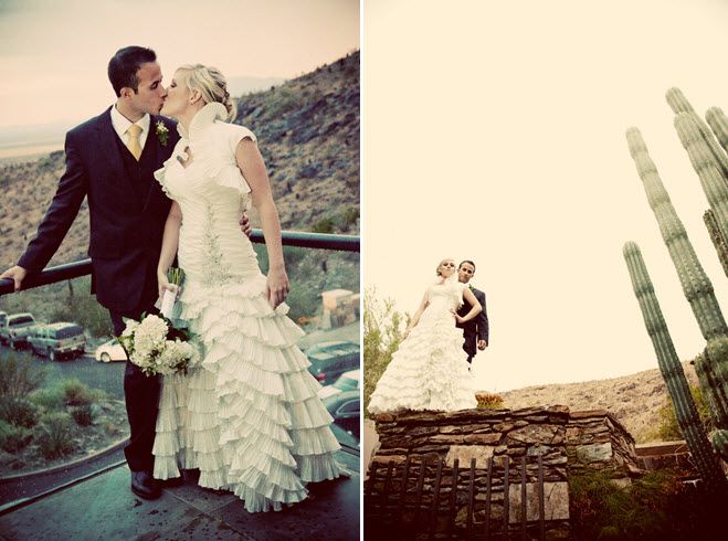 Bride and groom kiss during Arizona sunset, with mountains and cacti in backdrop