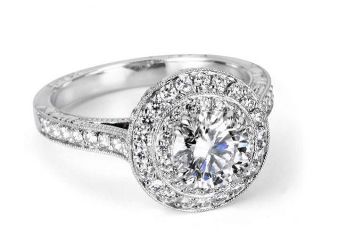 Diamond engagement ring with pave channel set platinum setting
