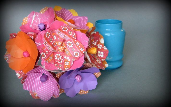 Colorful offbeat paper bridal bouquet in orange, purple and blue color palette