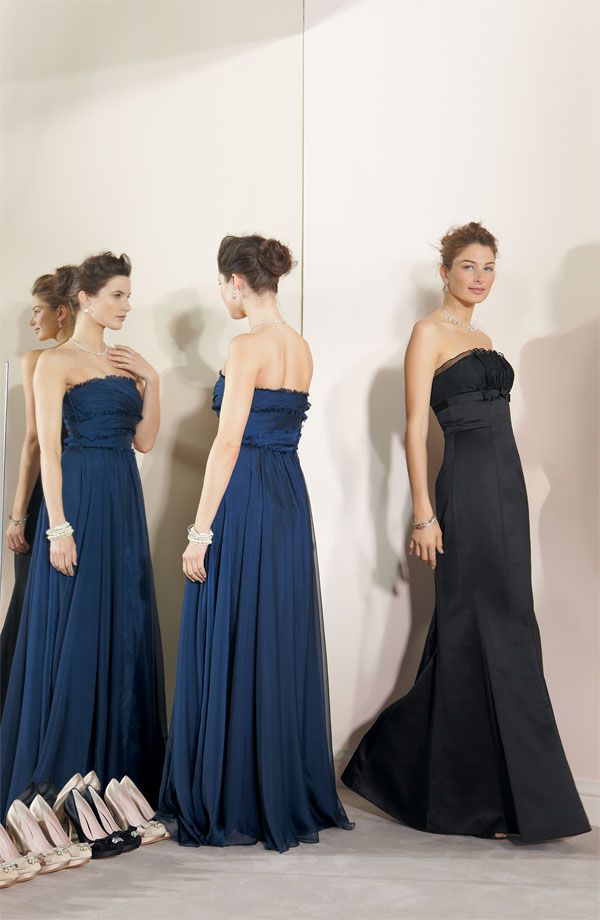 Elegant navy blue and black strapless bridesmaids’ gowns by Monique Lhuillier