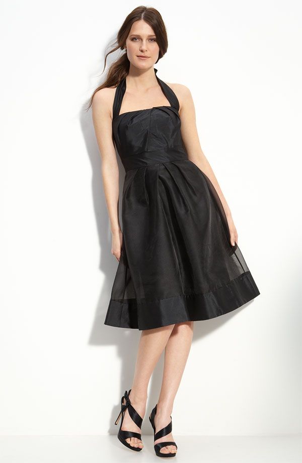 Black halter neckline bridesmaids dress with full knee-length skirt