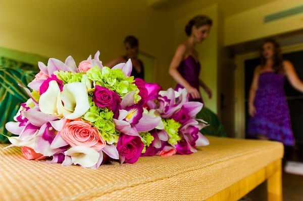 Vibrant tropical bridesmaids bouquets