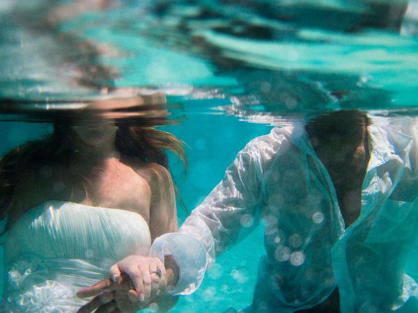 Underwater trash the dress photo session