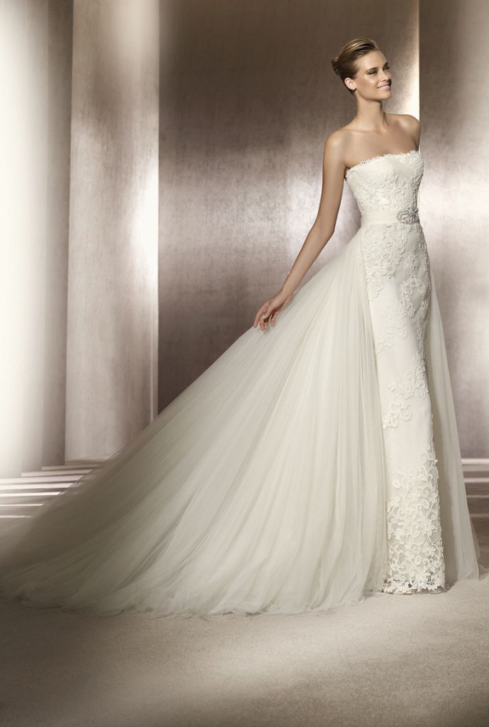 Strapless lace wedding dress with tulle train and bridal belt