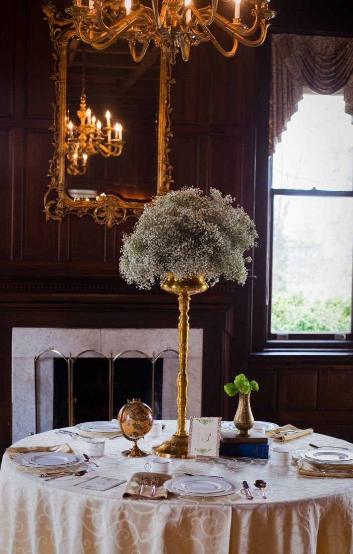 High wedding centerpiece of baby’s breath