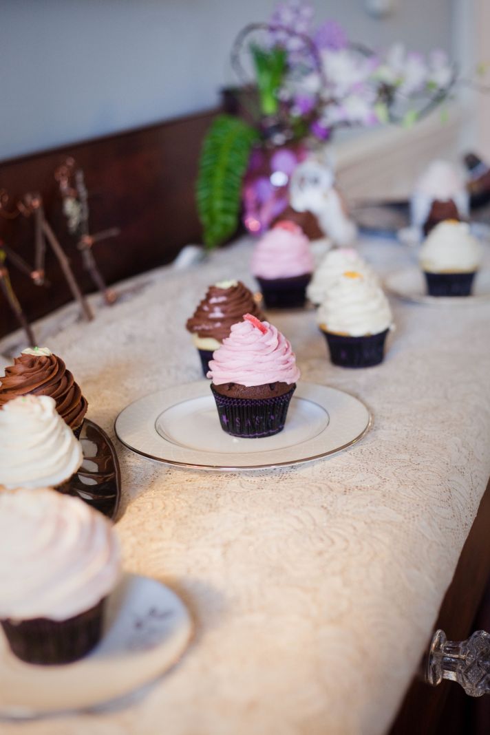 Add eye-catching details to your wedding reception decor with a cupcake display