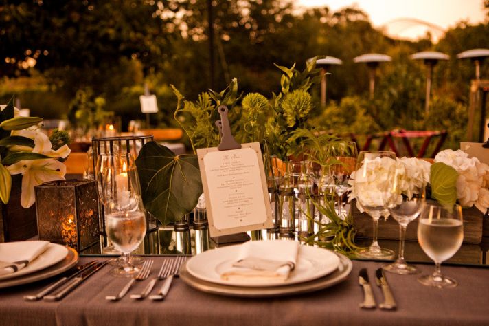 elegant outdoor wedding reception greenery as table decor