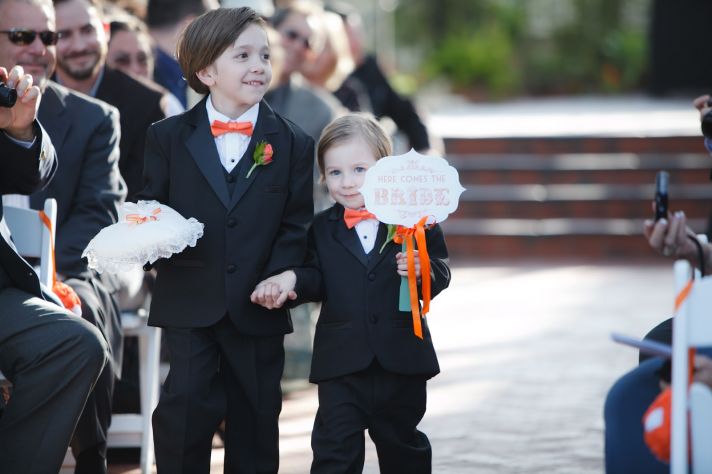 cute ring bearers priceless wedding photos orange black white