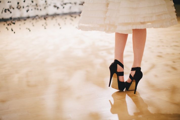 Ivory LWD with ruffled tiers black wedding heels