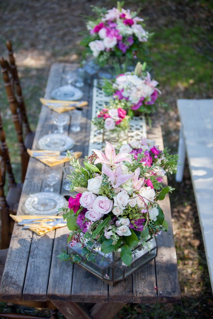 Romantic outdoor wedding reception table vintage chairs