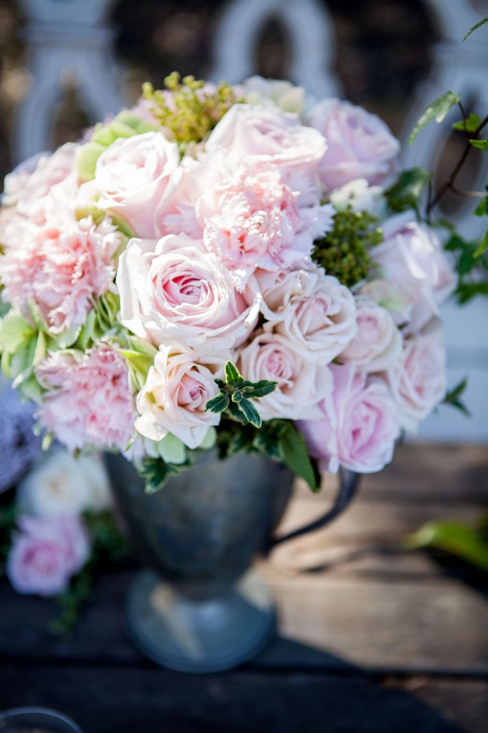 Romantic outdoor wedding reception table vintage chairs