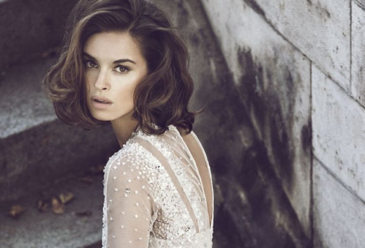 bombshell bride wedding hair and makeup look with beaded wedding dress