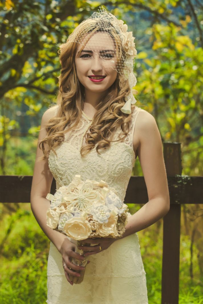 cream crochet wedding dress with high neckline