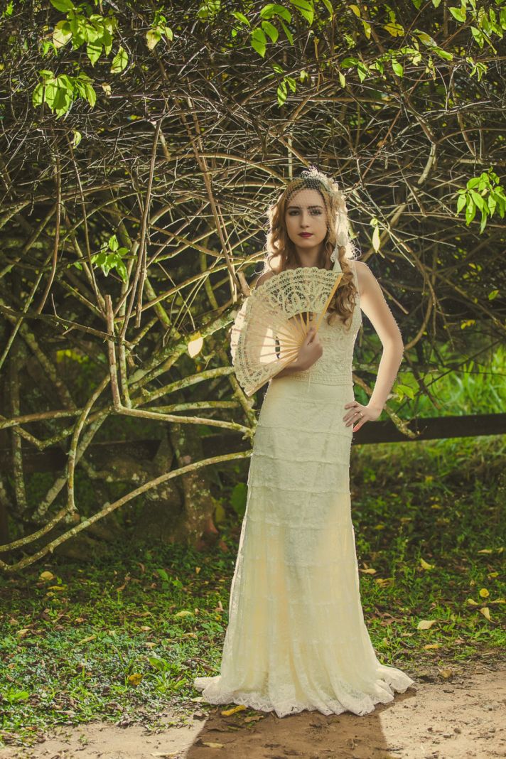 cream crochet wedding dress with high neckline