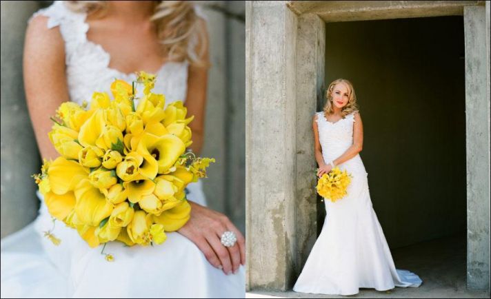bride in beautiful lace wedding dress holds bright yellow bouquet