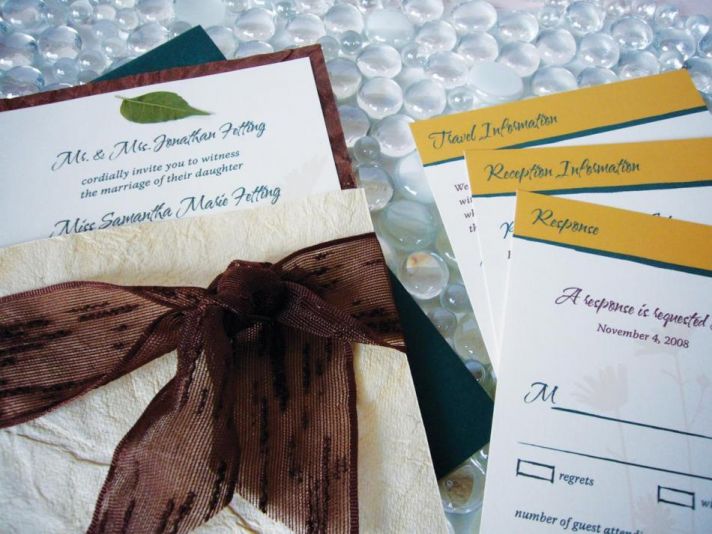 Stunning chocolate brown, gold and white wedding stationery with leaf detail