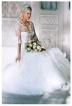 Three quarter sleeve white wedding dress with embroidered tulle skirt