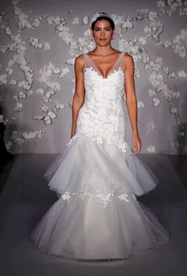 Beautiful white lace wedding dress with two tier drop waist skirt, illusion straps