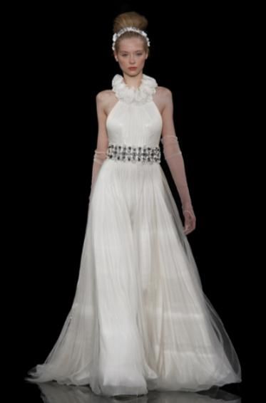 A-line ivory wedding dress with turtle neck collar made from fabric rosettes and jeweled belt at nat