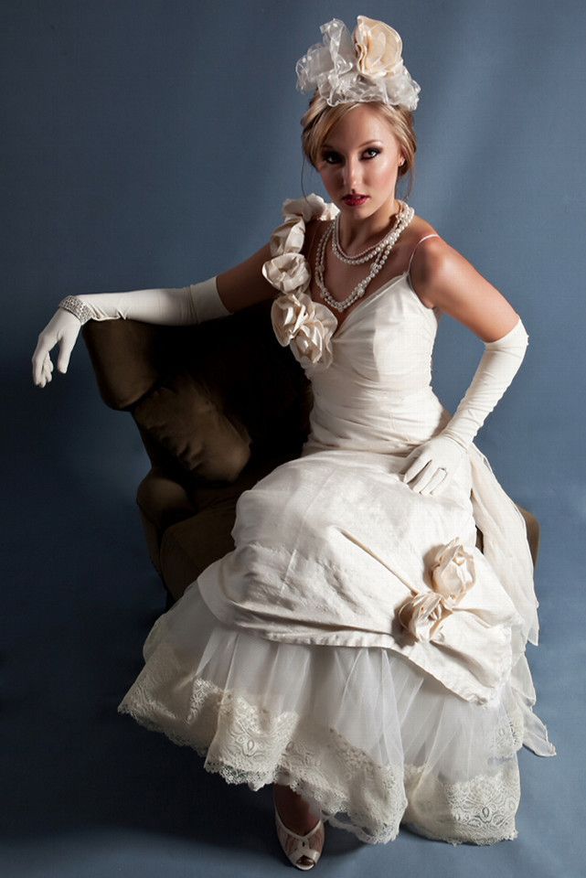 1940s bridal look- Chanel neck treatment, v-neck ivory wedding dress with rosette details