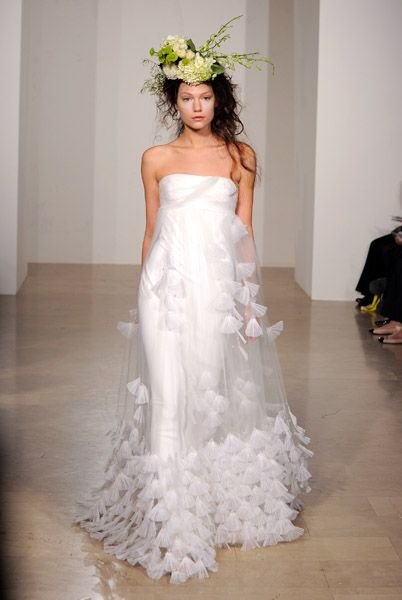 Strapless white wedding dress with fan-like sheer applique