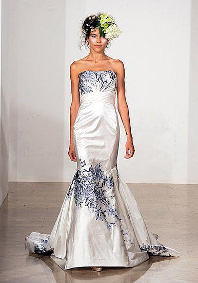 Strapless mermaid wedding dress with bunches of navy and sky blue florals