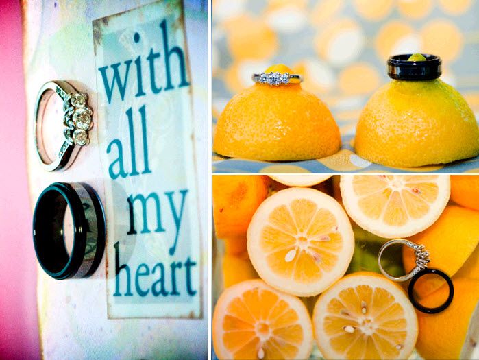 Bride’s engagement ring and grooms wedding band sit on bright yellow lemons