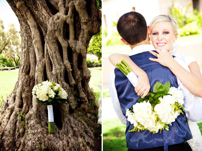 Bride’s ivory and green fresh flower bridal bouquet photographed artistically against large tree