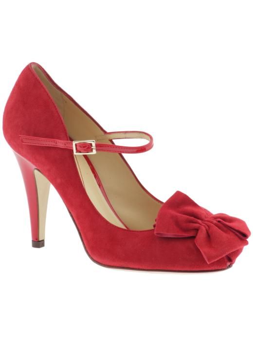 Funky red suede Kate Spade bridal heels with flower applique at vamp