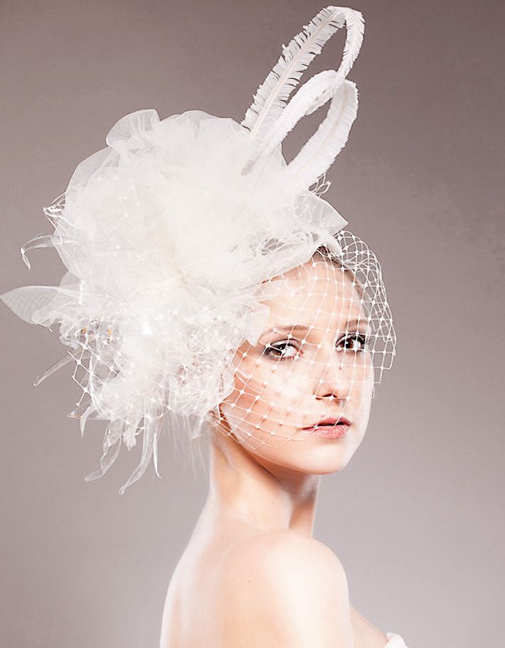 Haute couture white wedding fascinator with French net veil and feather details