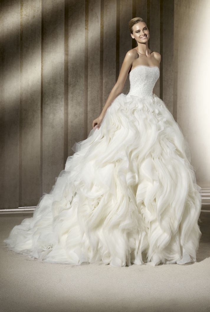 Dramatic ballgown wedding dress with layered skirt