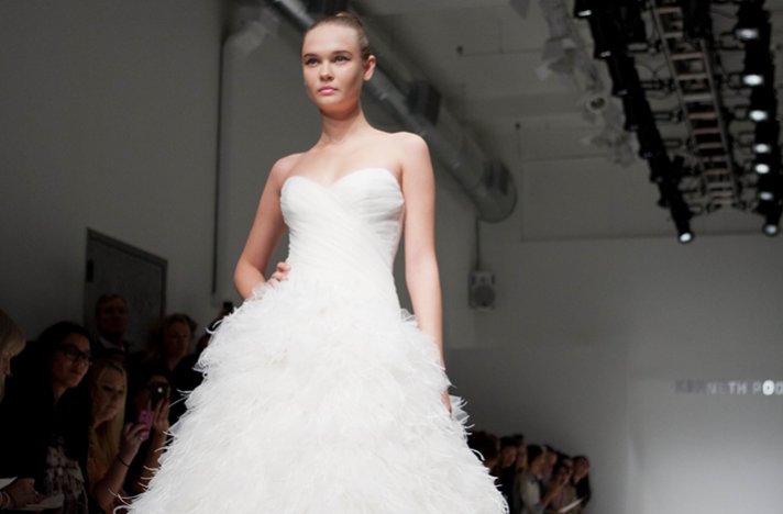 Modern feather-adorned ballgown wedding dress