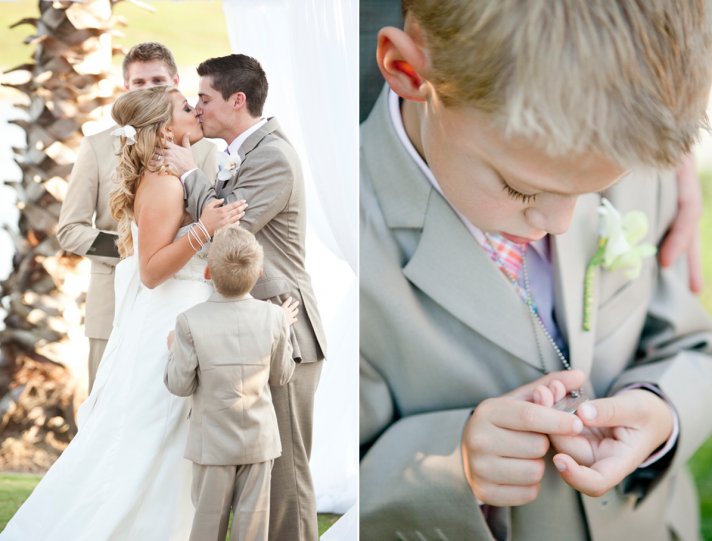 Beach bride and groom kiss at wedding ceremony alter