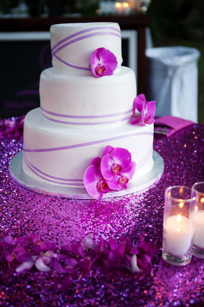 elegant winery wedding in Malibu classic wedding cake with fuschia orchids