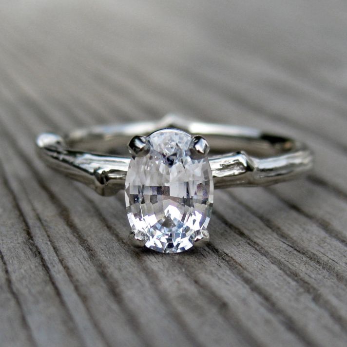Oval engagement ring with rustic twig band