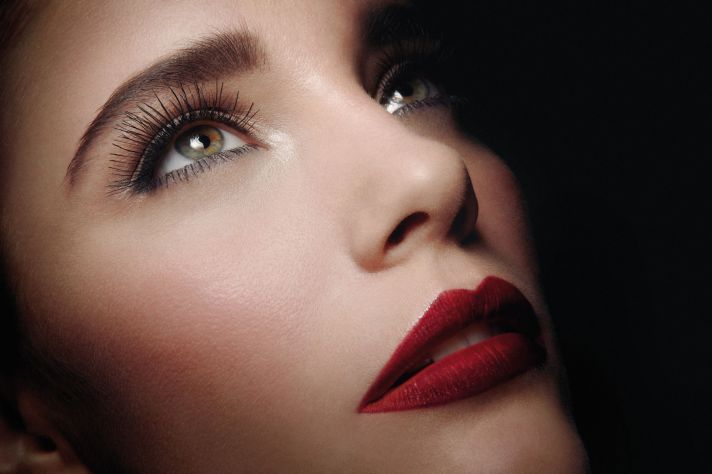 Timeless wedding makeup with long lashes deep red lips